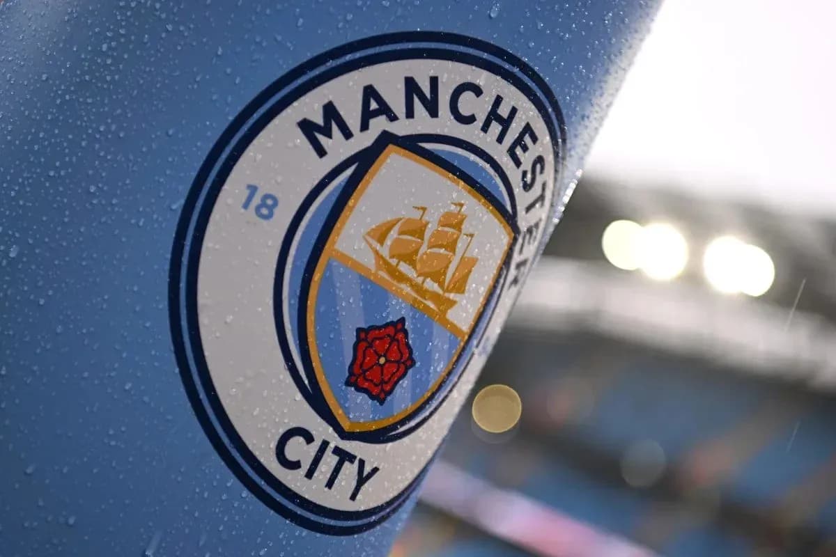 Close-up of Manchester City club logo with raindrops Close-up of Manchester City club logo with raindrops
