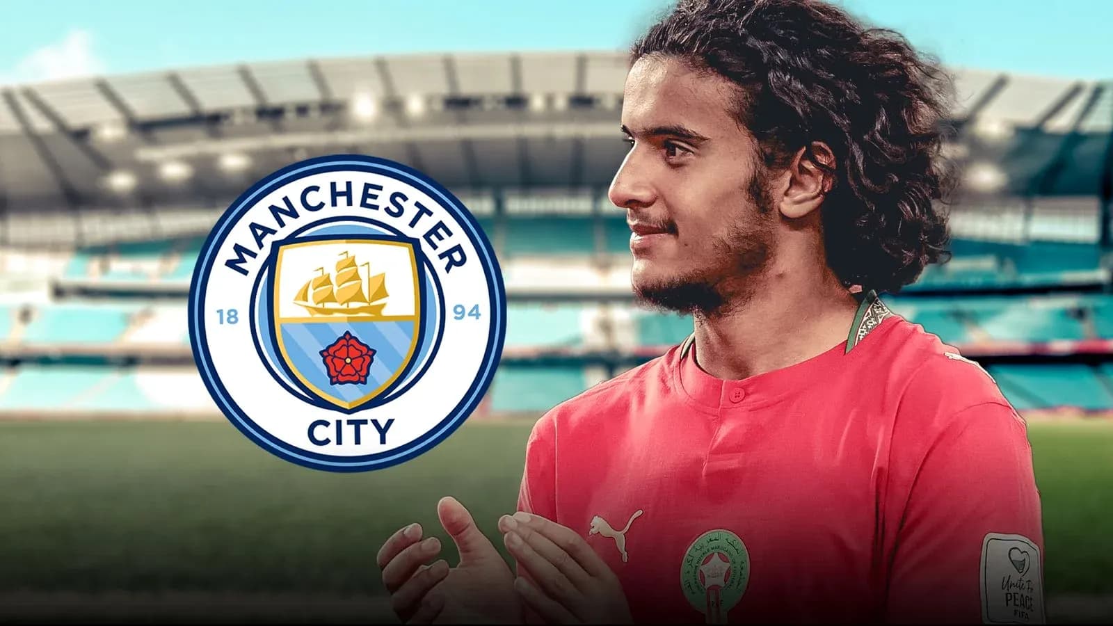 Player in Manchester City jersey with stadium background Player in Manchester City jersey with stadium background