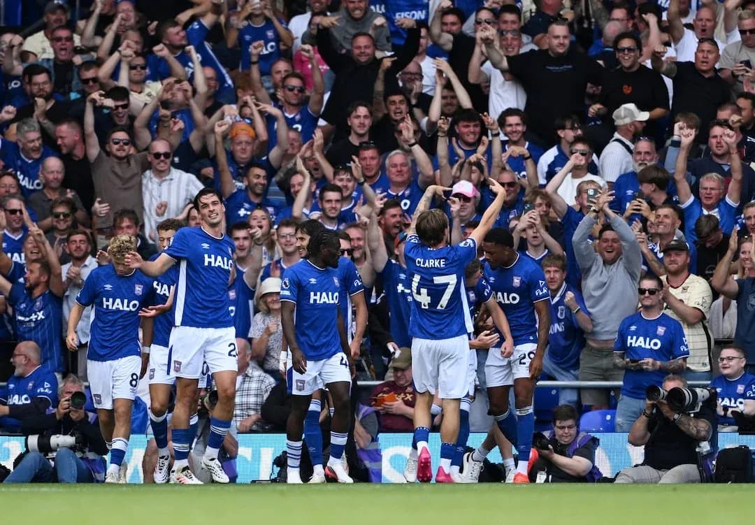 Ipswich players celebrating a goal with fans Ipswich players celebrating a goal with fans