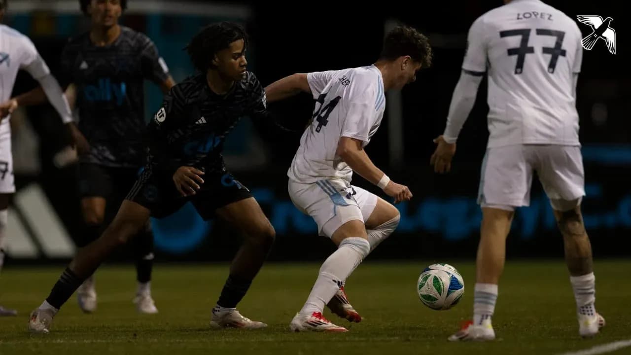 Crown Legacy player battling for the ball Crown Legacy player battling for the ball