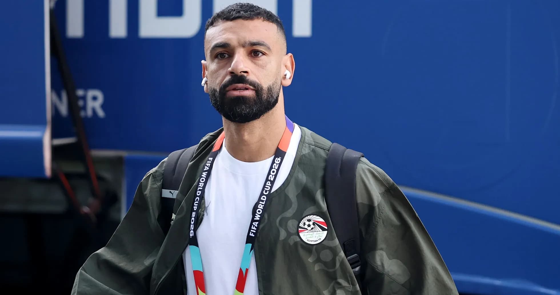 Player arriving with headphones before match Player arriving with headphones before match