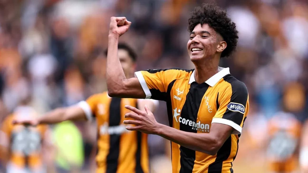 Player celebrating a goal in team jersey Player celebrating a goal in team jersey