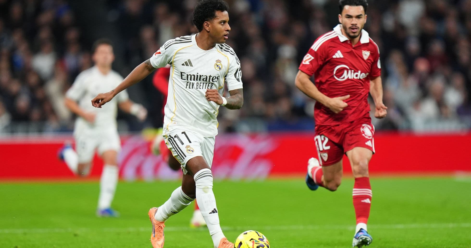 Player dribbling the ball during Sevilla match Player dribbling the ball during Sevilla match