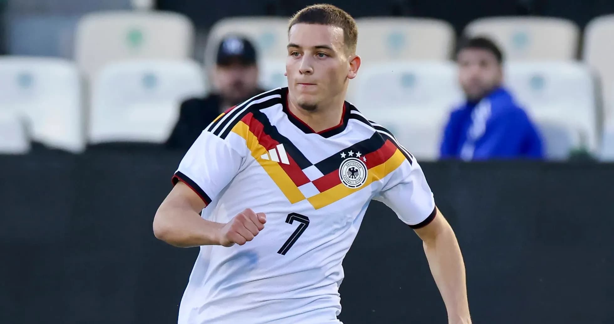 Player wearing Germany kit running during match Player wearing Germany kit running during match