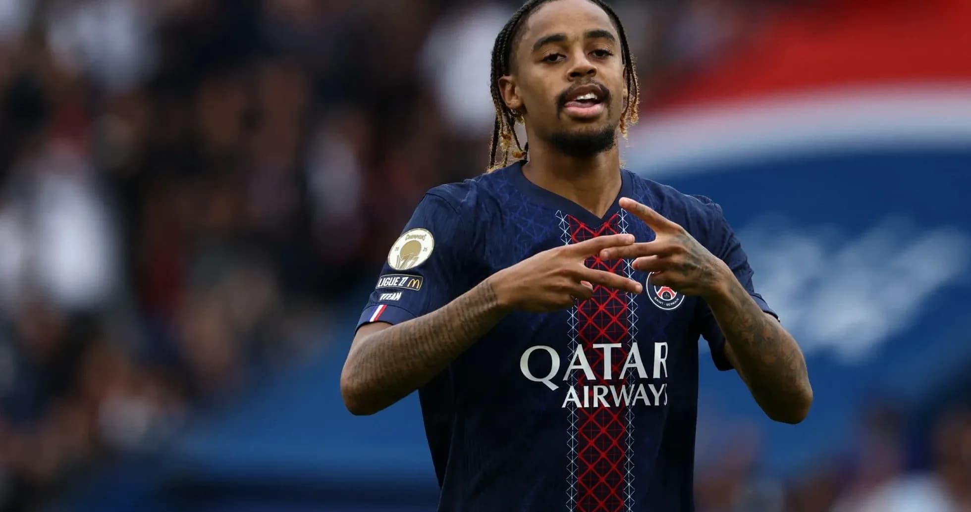 Player celebrating in PSG jersey during match Player celebrating in PSG jersey during match