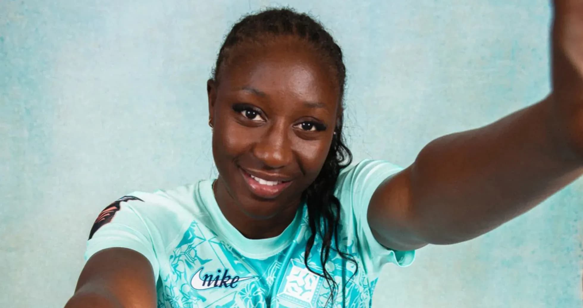 Athlete posing in mint green sports jersey Athlete posing in mint green sports jersey