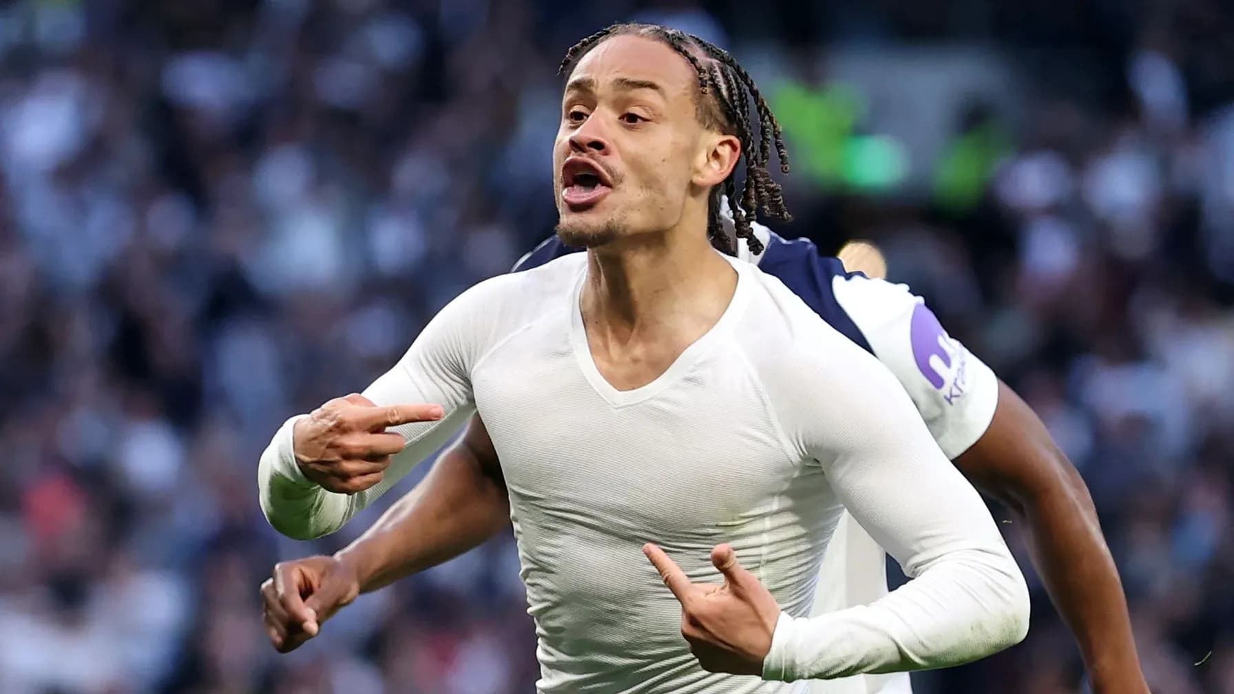 Player celebrating a goal with pointed gestures Player celebrating a goal with pointed gestures