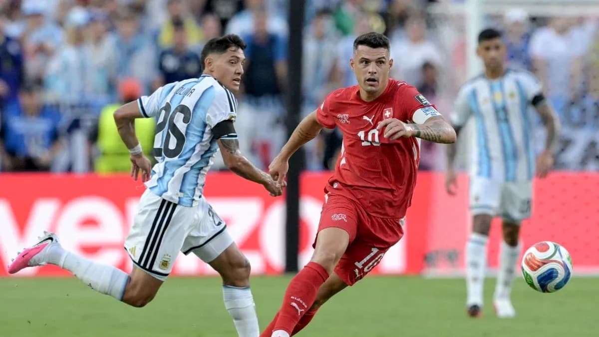 Player chasing the ball during Argentina vs Switzerland match Player chasing the ball during Argentina vs Switzerland match