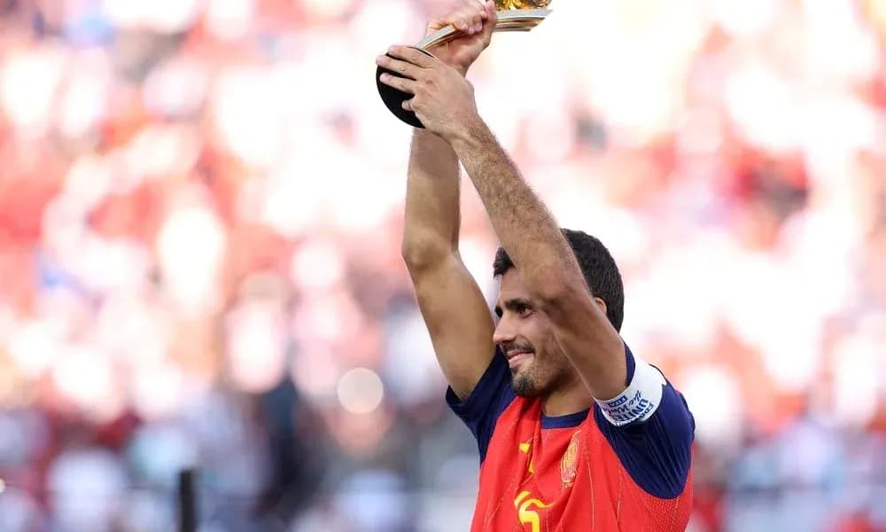 Player celebrating with trophy in stadium Player celebrating with trophy in stadium