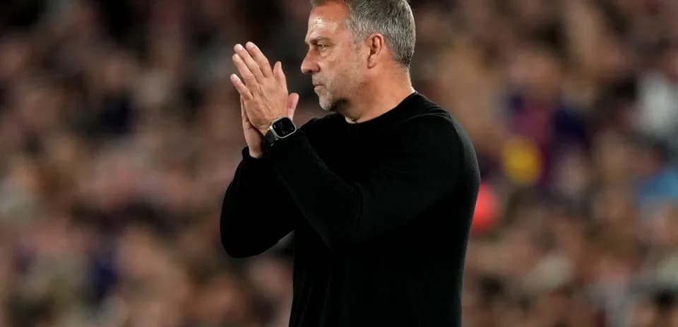 Coach clapping on the sidelines during a match Coach clapping on the sidelines during a match