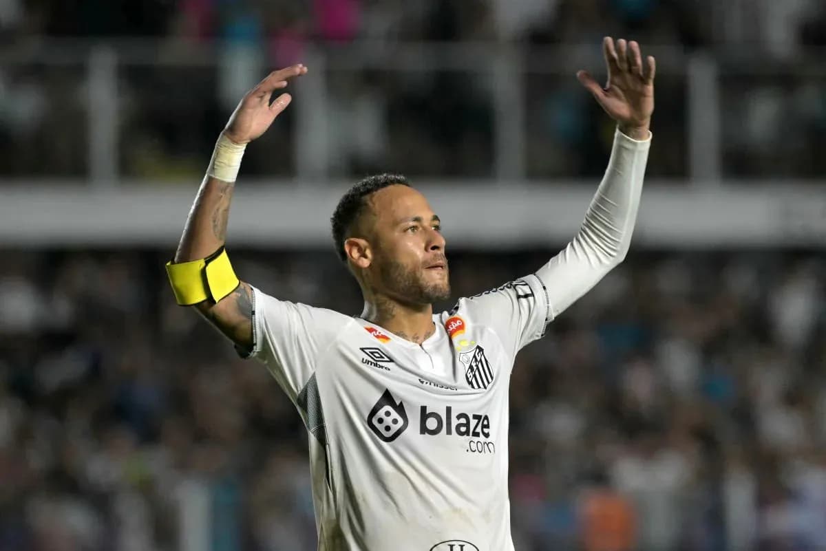 Player celebrating in Santos FC jersey during match Player celebrating in Santos FC jersey during match