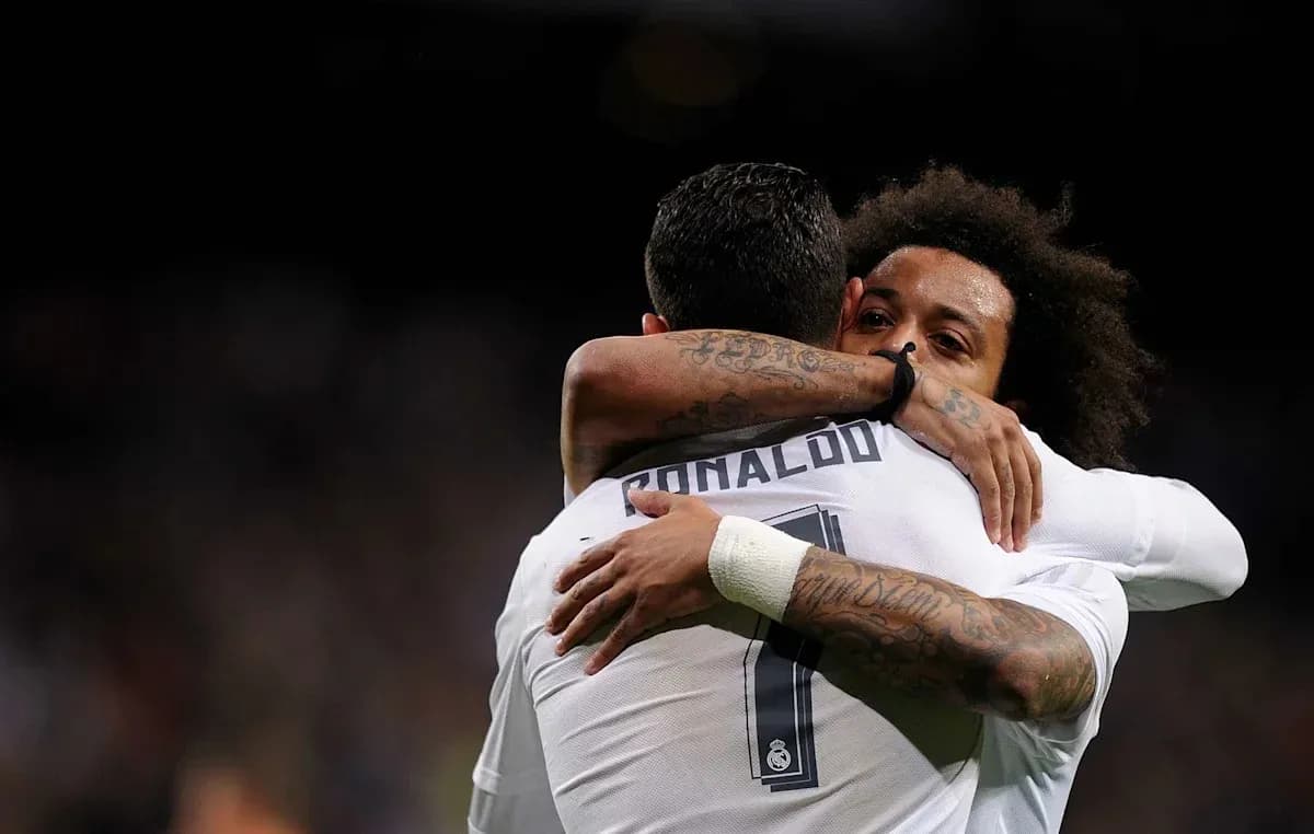 Cristiano Ronaldo and Marcelo celebrating an embrace Cristiano Ronaldo and Marcelo celebrating an embrace