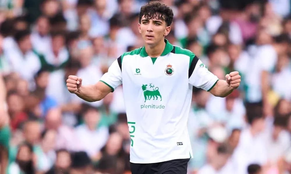 Player celebrating in team jersey during match Player celebrating in team jersey during match