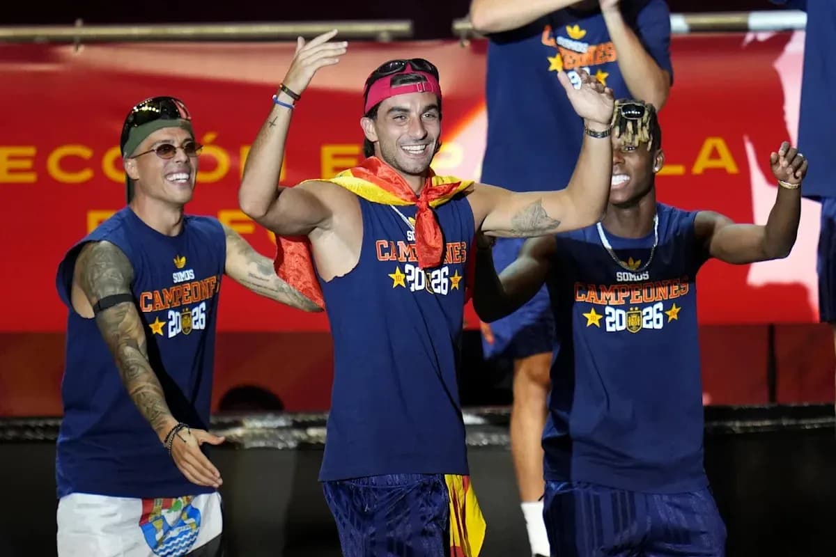 Players celebrating with a trophy at event Players celebrating with a trophy at event