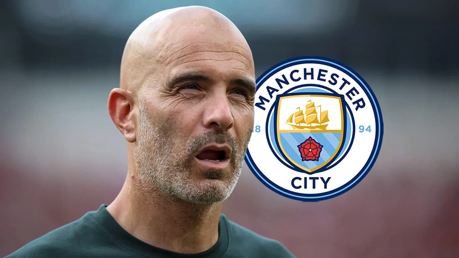 Coach with Manchester City logo in background Coach with Manchester City logo in background