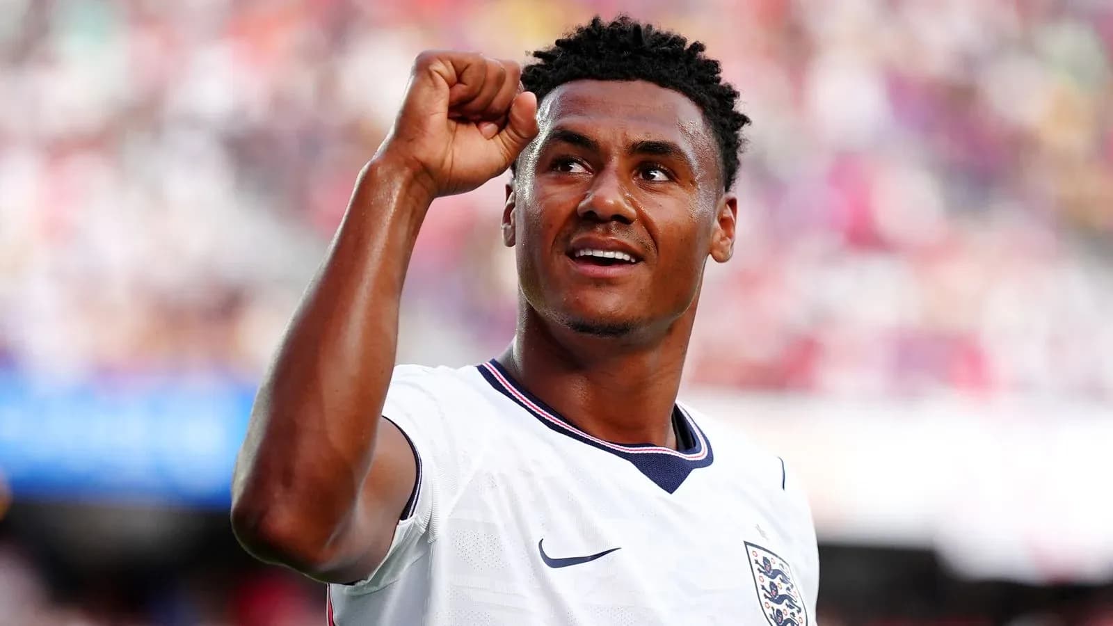 Player celebrating with raised fist during match Player celebrating with raised fist during match