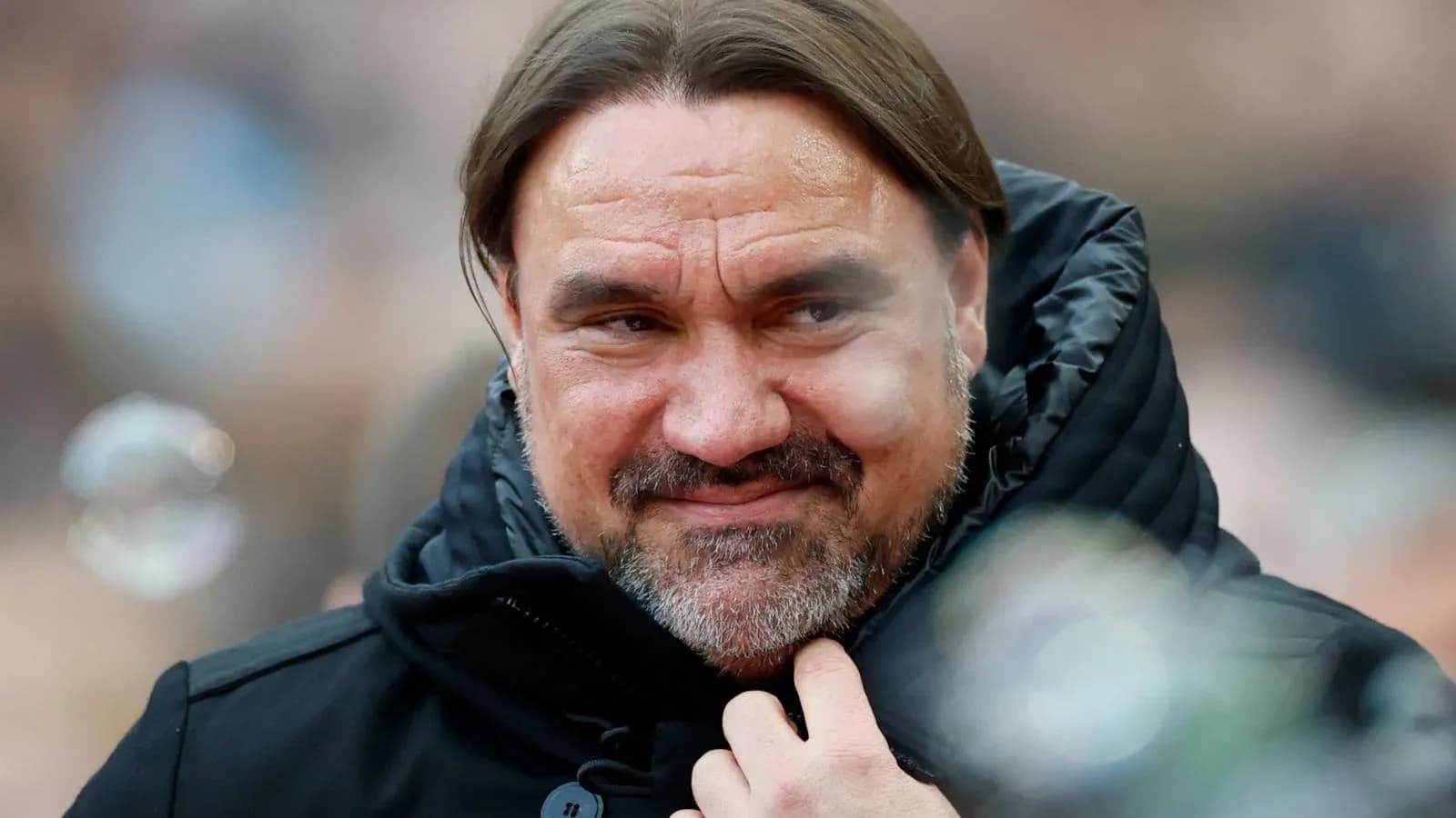 Coach in black jacket at a match Coach in black jacket at a match