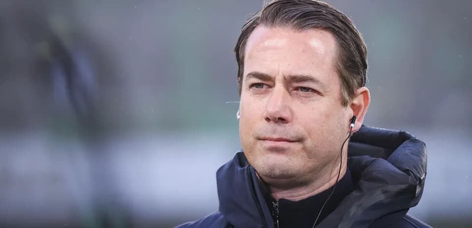 Man wearing headphones during a sporting event Man wearing headphones during a sporting event