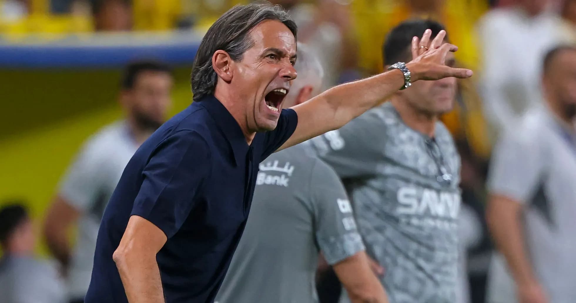 Coach shouting instructions from the sidelines during match Coach shouting instructions from the sidelines during match