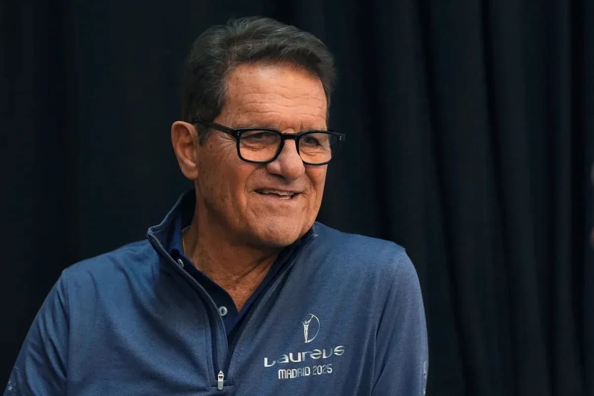 Man smiling while wearing a blue jacket Man smiling while wearing a blue jacket