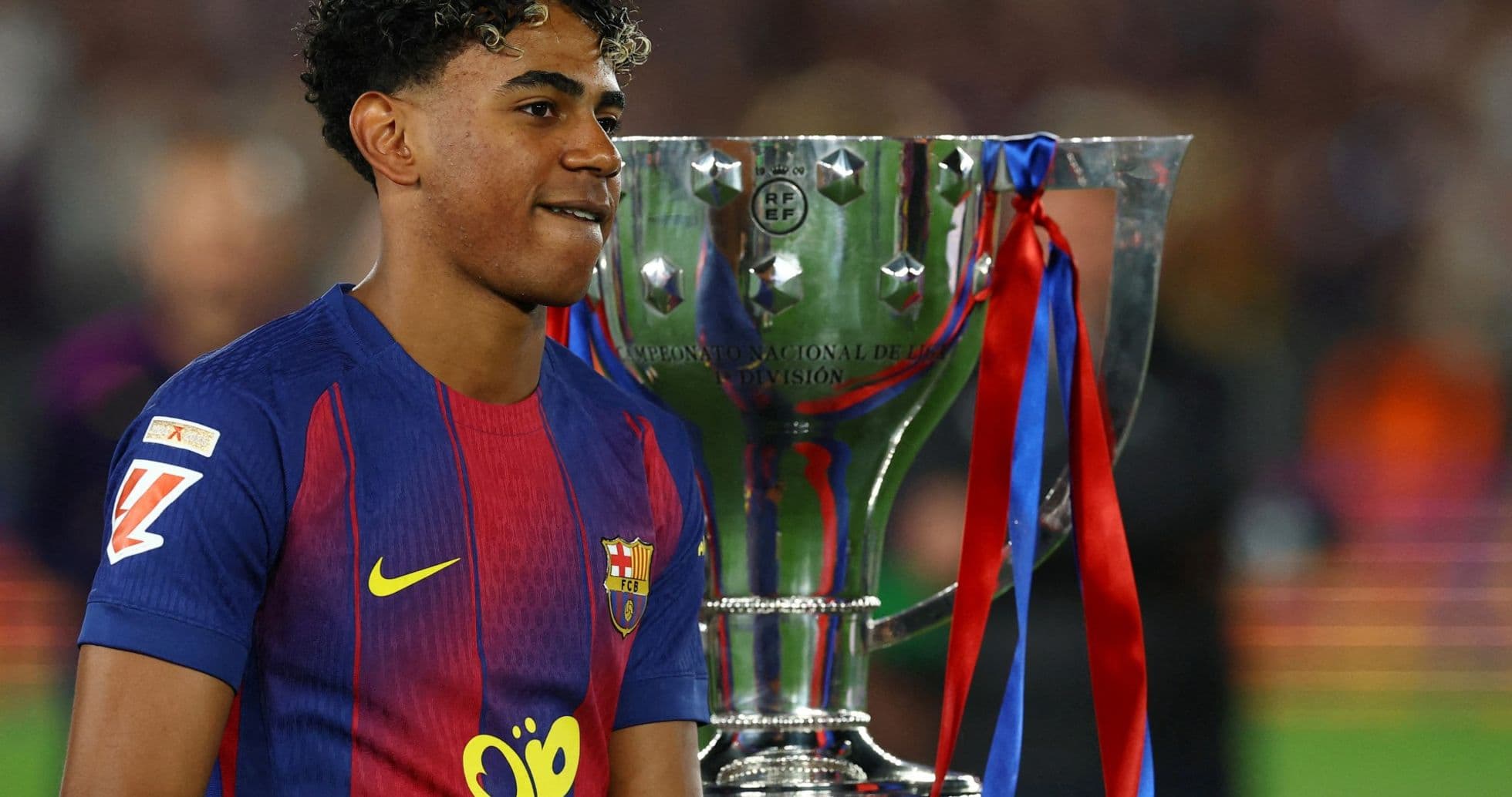 Player celebrating with trophy after winning match Player celebrating with trophy after winning match