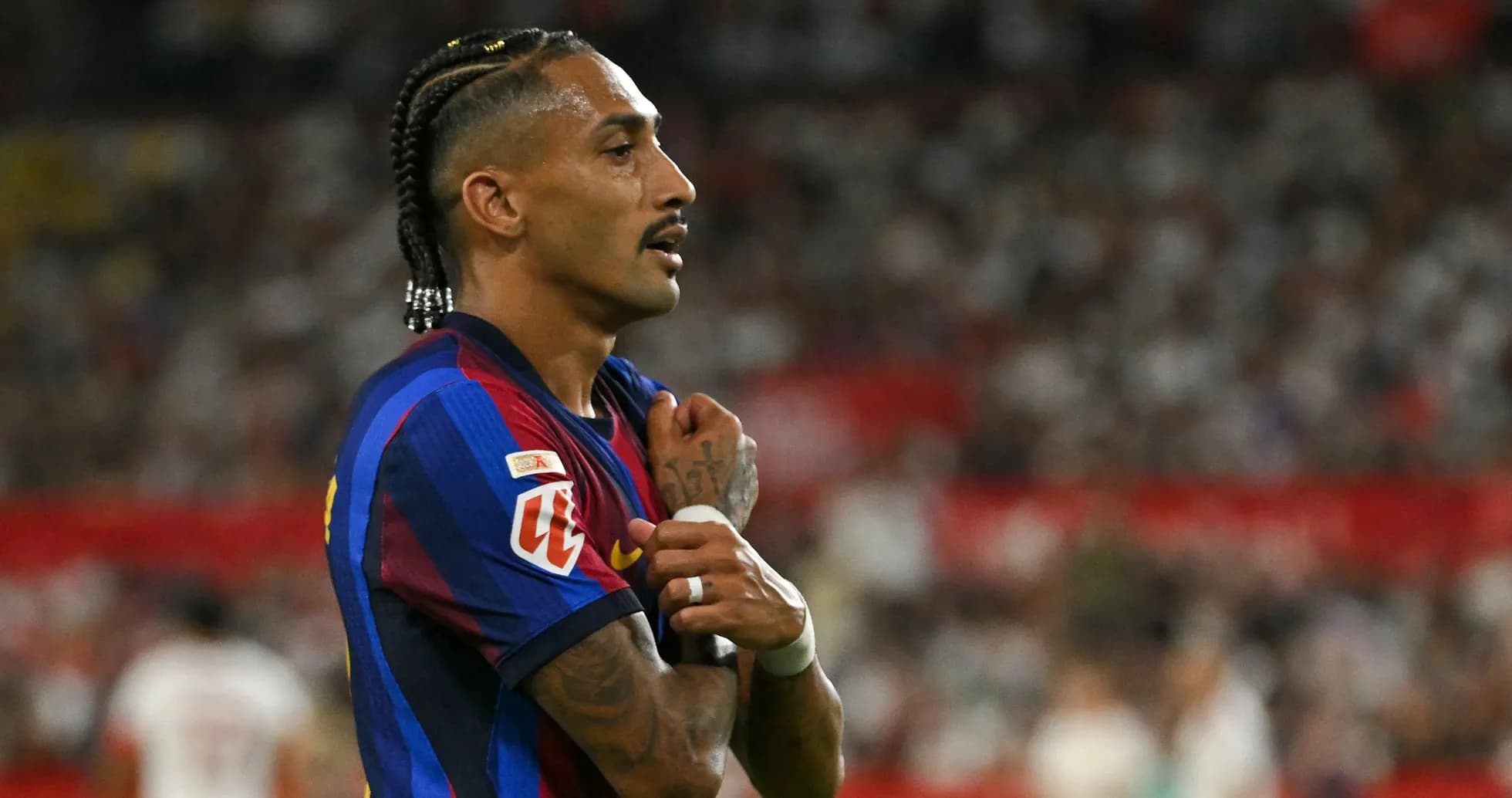 Player with braided hair on the pitch during match Player with braided hair on the pitch during match