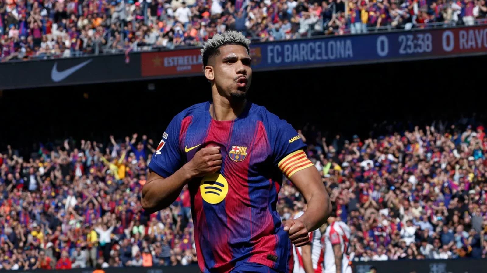 Player celebrating a goal during FC Barcelona match Player celebrating a goal during FC Barcelona match