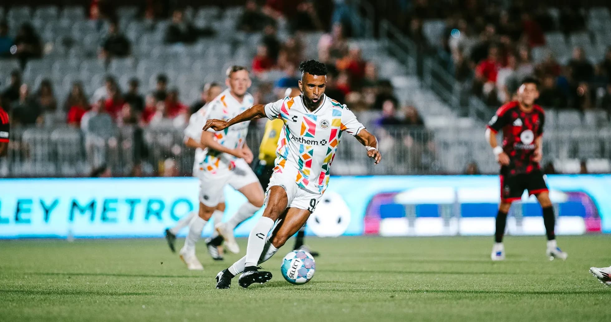 Player dribbling the ball during match Player dribbling the ball during match