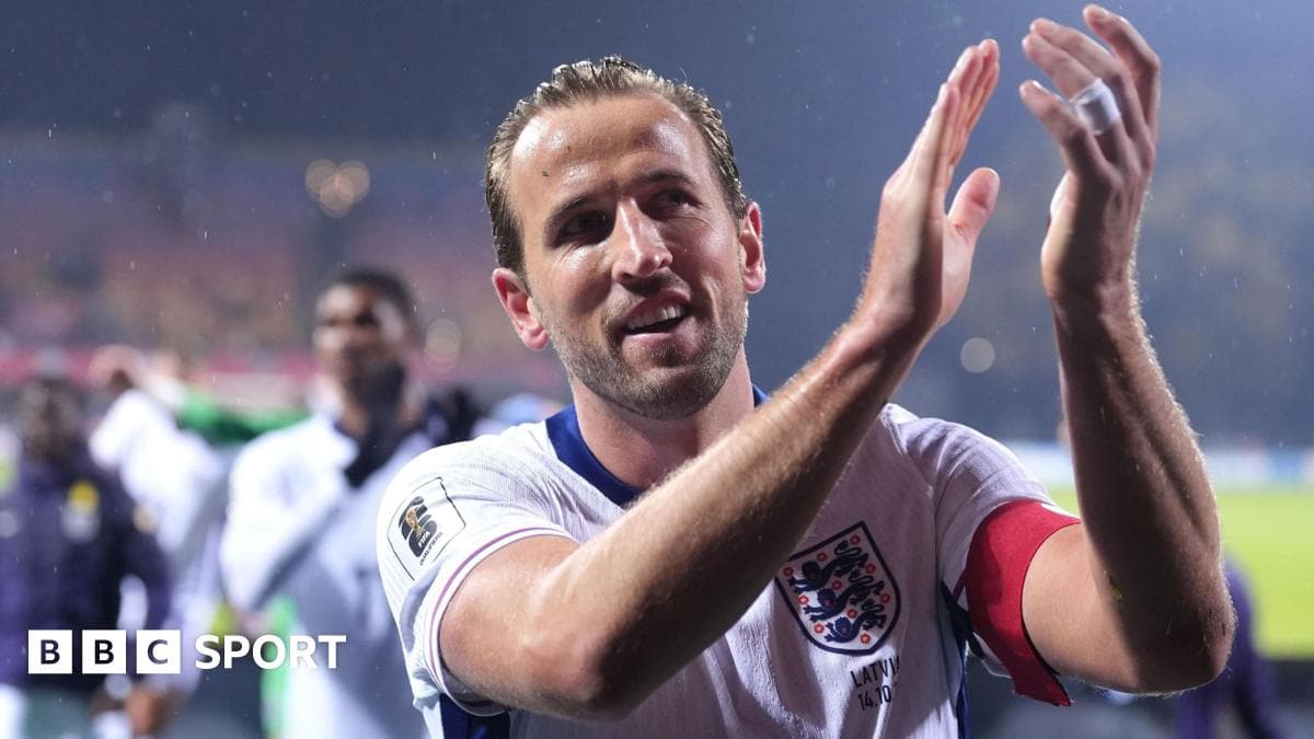 Player applauding fans after match in rain Player applauding fans after match in rain