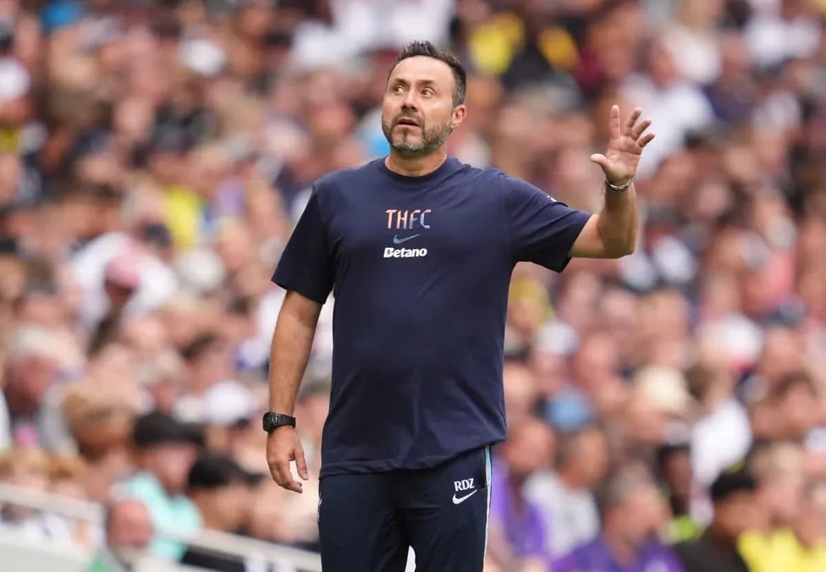Manager gesturing on the sideline during match Manager gesturing on the sideline during match