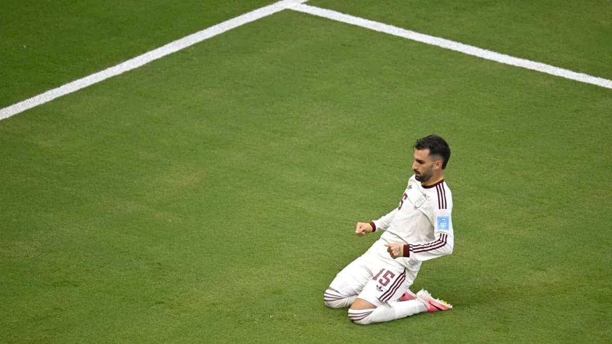 Player celebrating after scoring a goal on field Player celebrating after scoring a goal on field