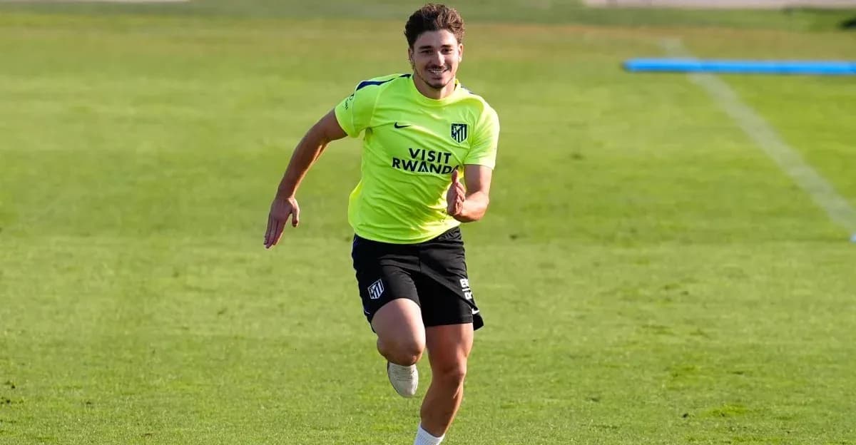 Player running during training session on field Player running during training session on field