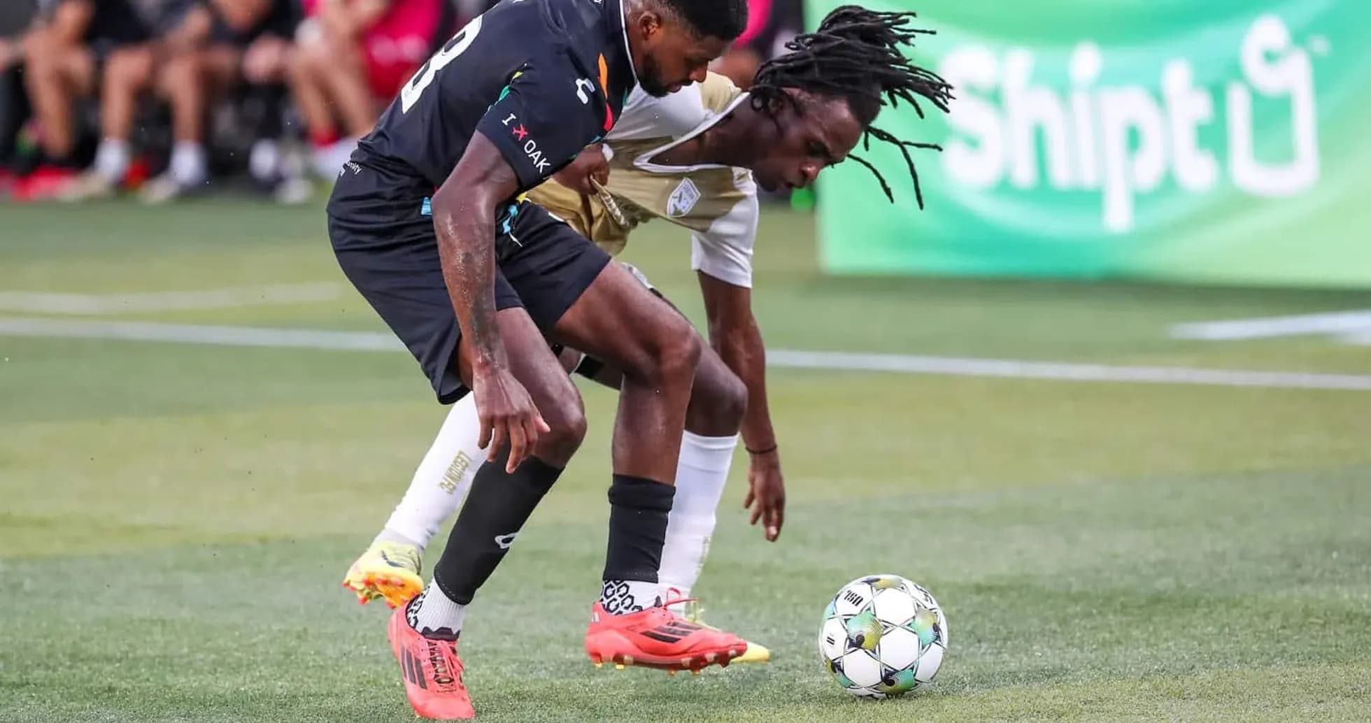 Players contesting for the ball in match Players contesting for the ball in match
