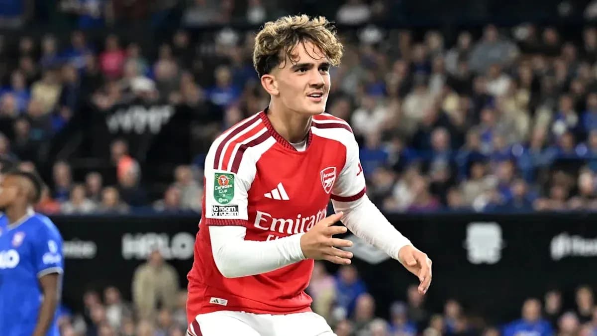 Arsenal player celebrating during match at stadium Arsenal player celebrating during match at stadium