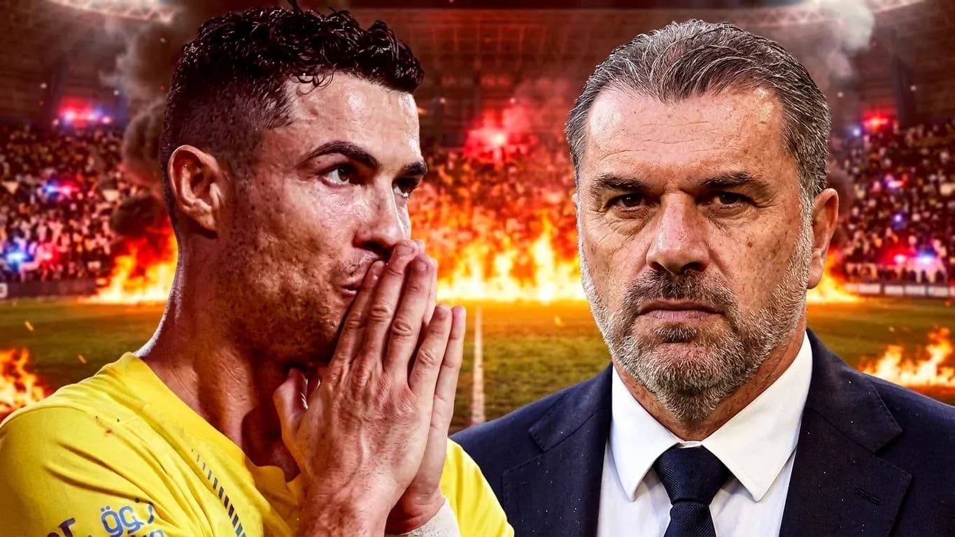 Cristiano Ronaldo and coach facing each other with crowd Cristiano Ronaldo and coach facing each other with crowd