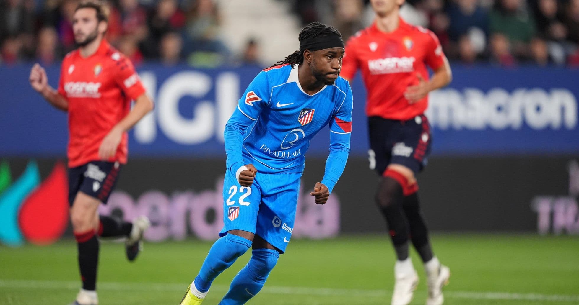 Atletico Madrid player running during match Atletico Madrid player running during match