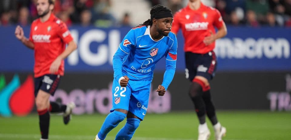 Atletico Madrid player running during match Atletico Madrid player running during match