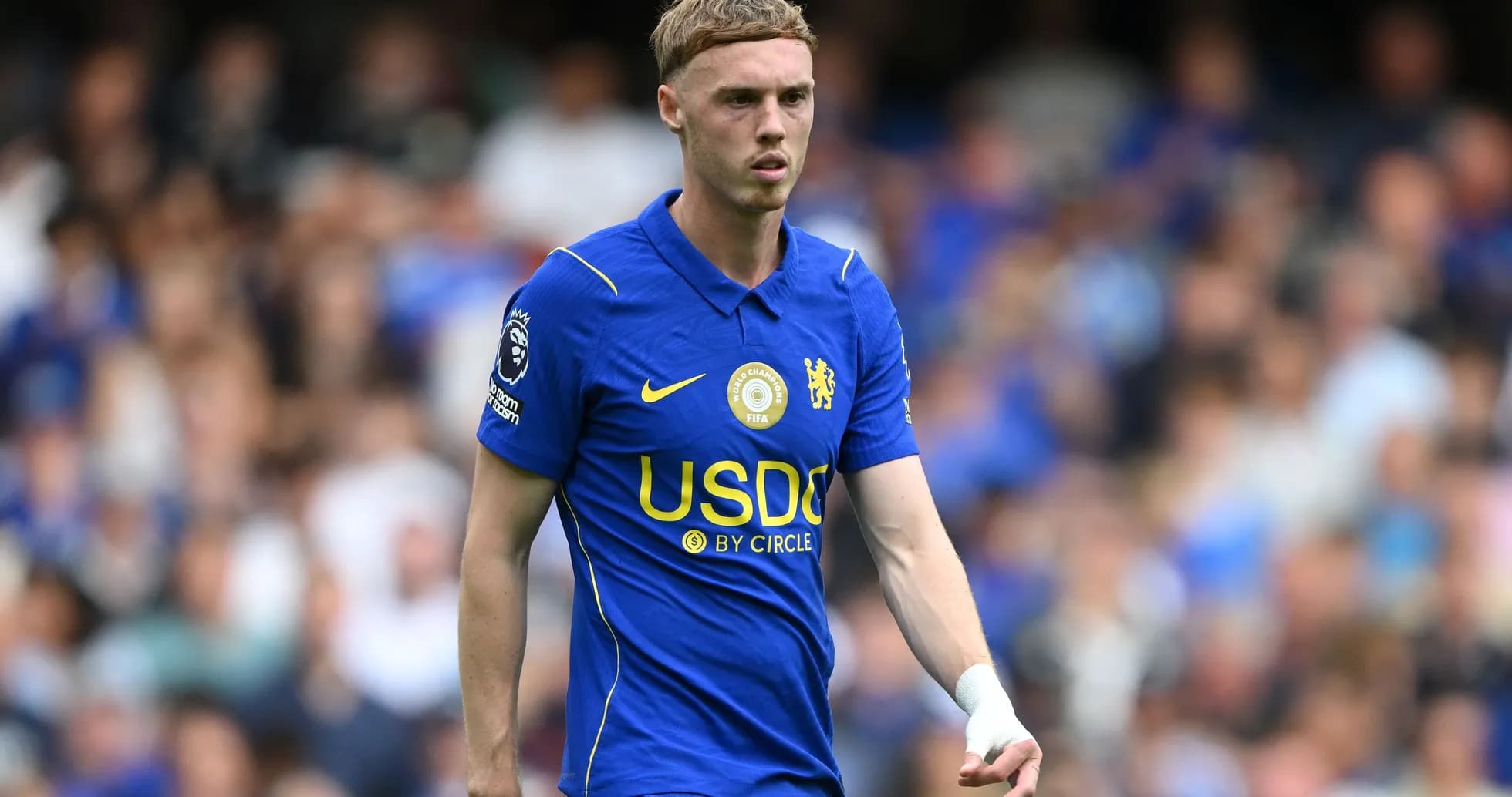Player in Chelsea kit walking on the pitch Player in Chelsea kit walking on the pitch