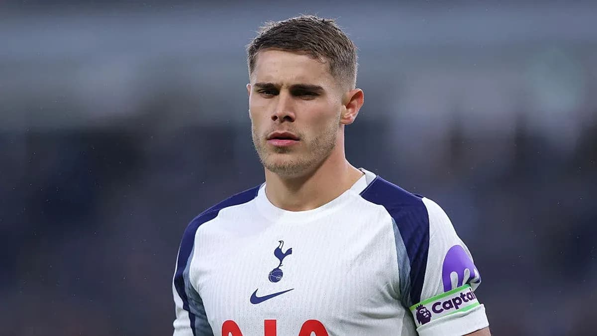 Player wearing Tottenham jersey with captain's armband Player wearing Tottenham jersey with captain's armband