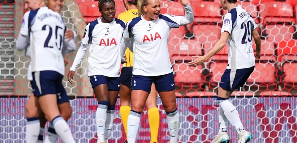 Tottenham players celebrating a goal during match Tottenham players celebrating a goal during match