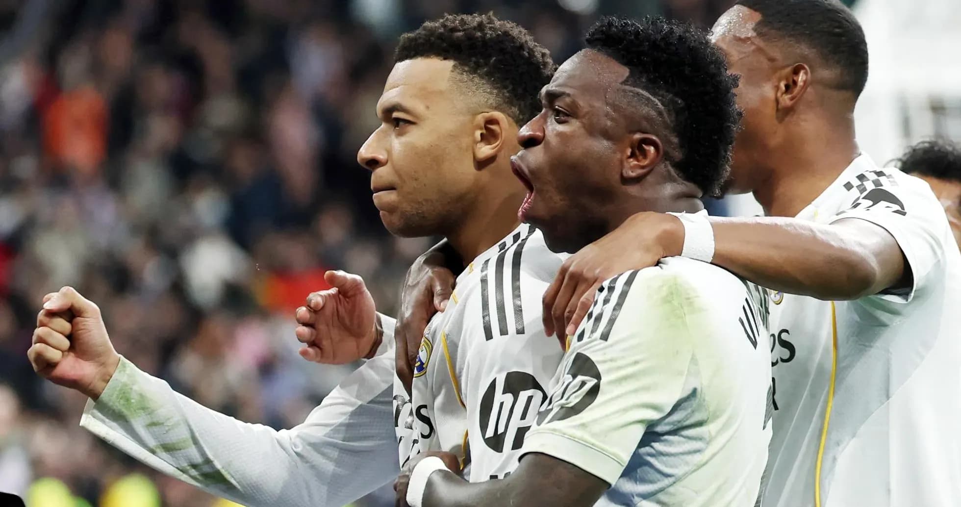 Real Madrid players celebrating a goal Real Madrid players celebrating a goal