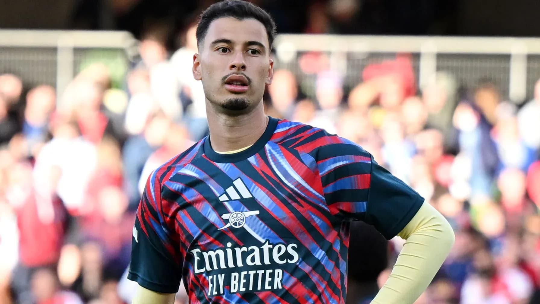 Goalkeeper wearing training kit on the pitch Goalkeeper wearing training kit on the pitch