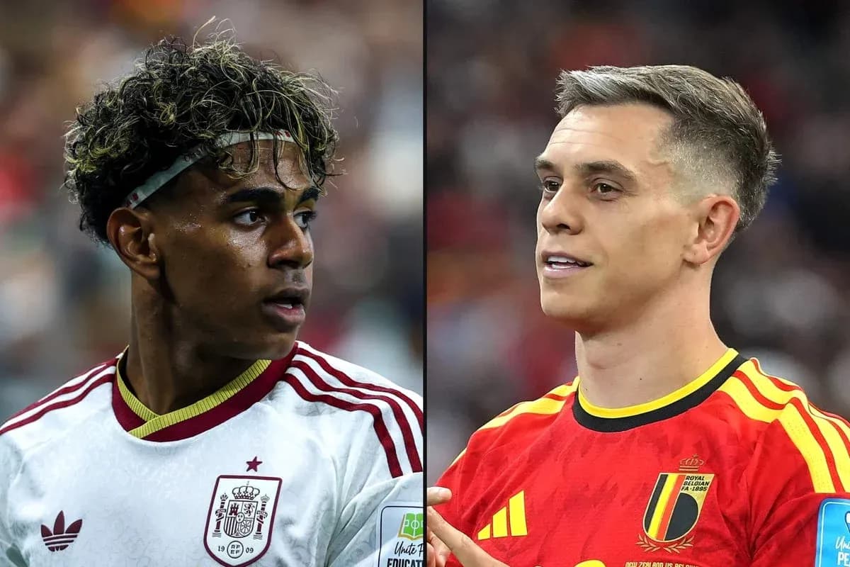 Two football players from Spain and Belgium in uniforms Two football players from Spain and Belgium in uniforms