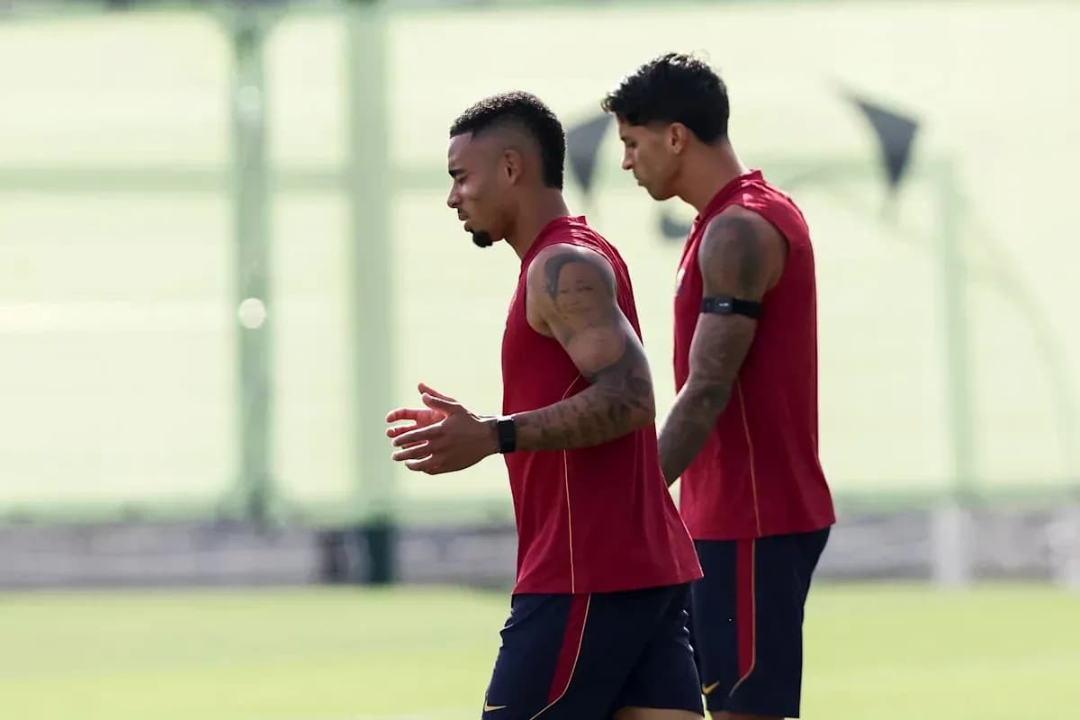 Two players jogging during a training session Two players jogging during a training session