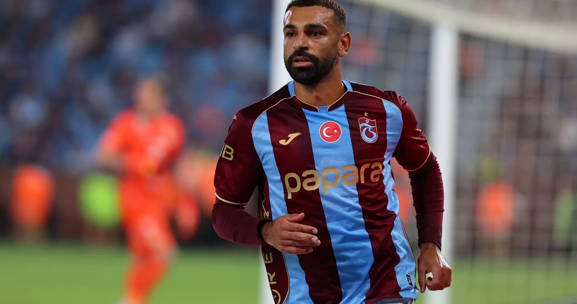 Trabzonspor player running during UEFA Europa League match Trabzonspor player running during UEFA Europa League match