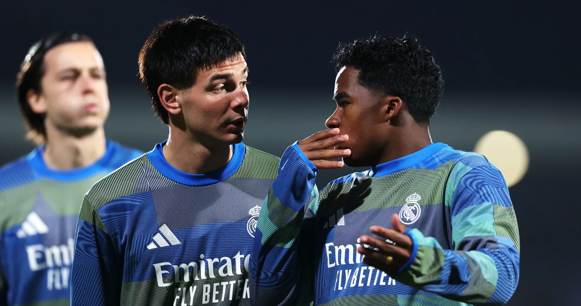 Two players conversing during training session Two players conversing during training session