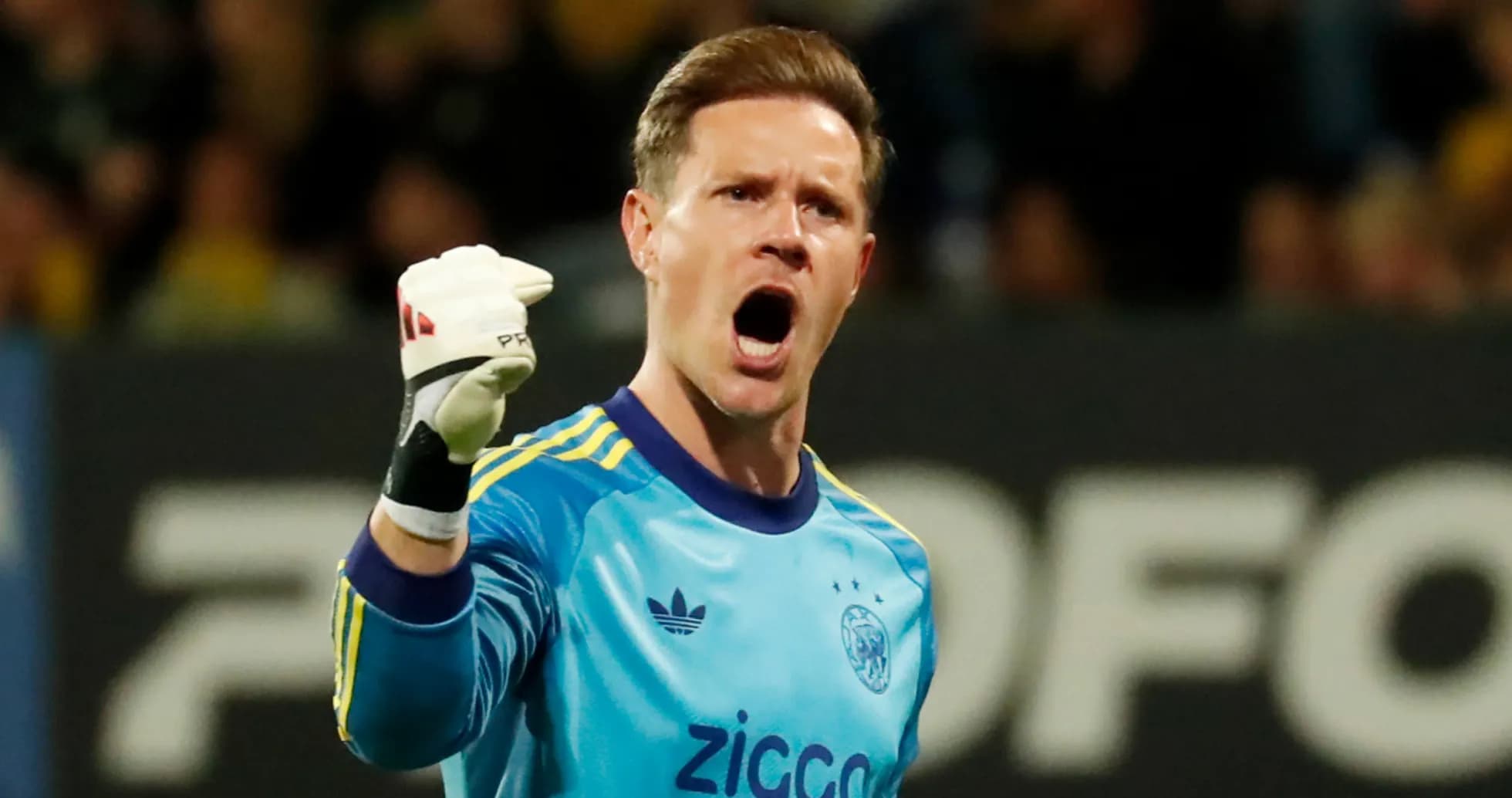 Goalkeeper celebrating a successful save during match Goalkeeper celebrating a successful save during match