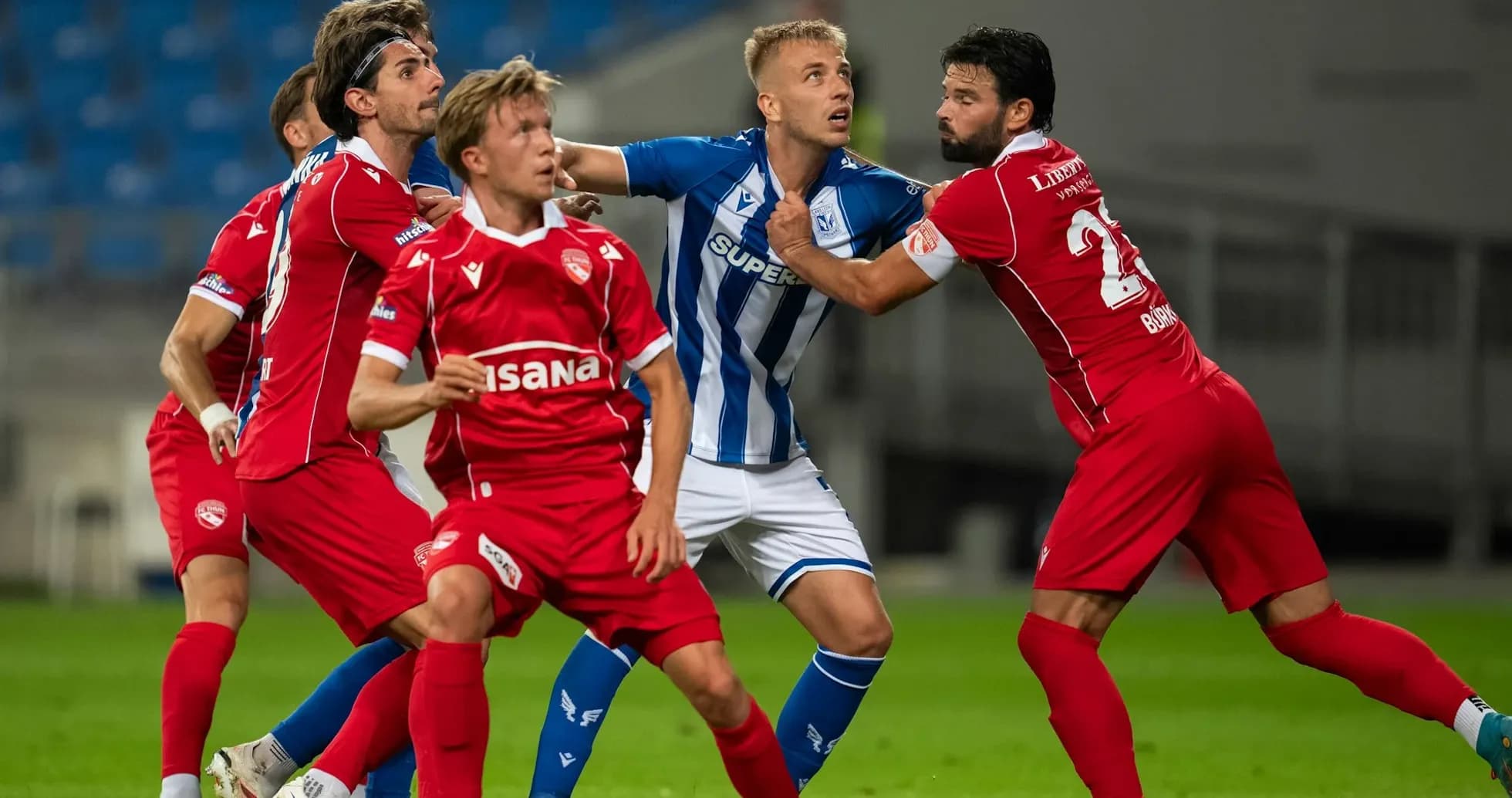 Lech Poznan players in confrontation with FC Thun Lech Poznan players in confrontation with FC Thun
