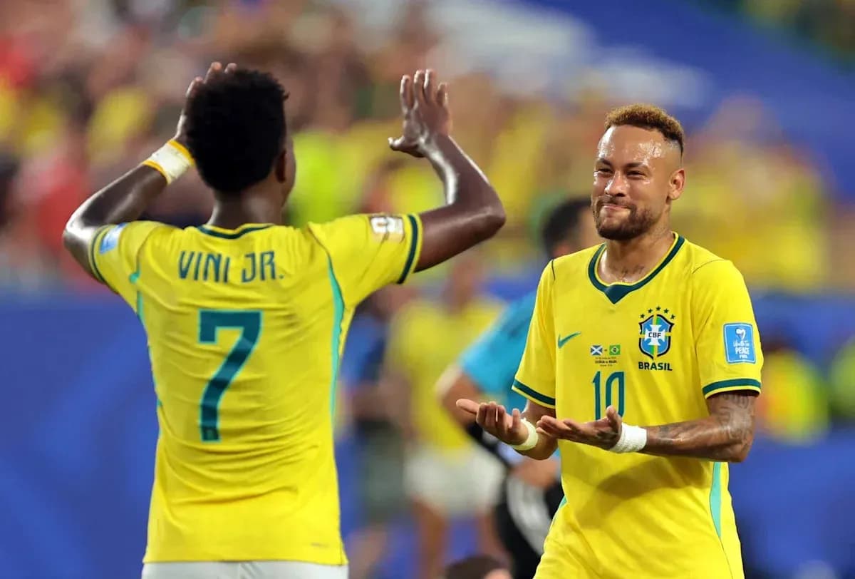 Neymar and Viní Jr. celebrating during a match Neymar and Viní Jr. celebrating during a match