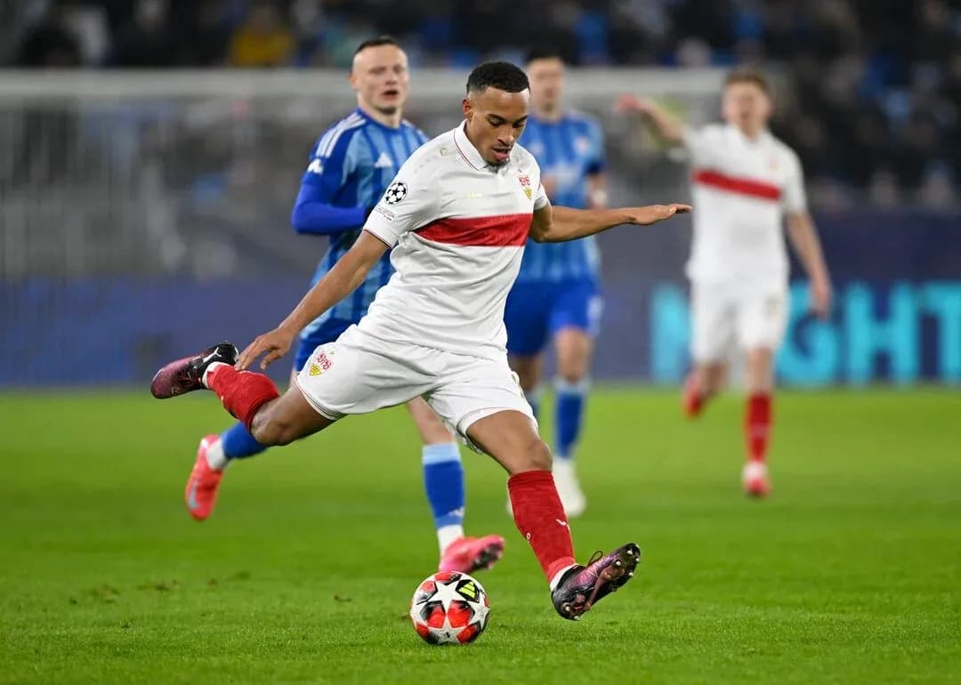 VfB Stuttgart player dribbling during Champions League match VfB Stuttgart player dribbling during Champions League match